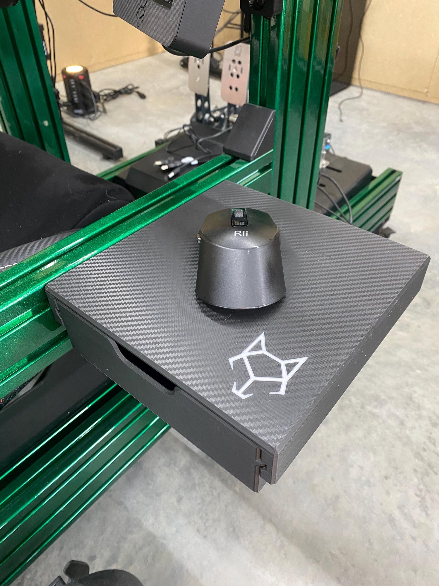 Carbon fiber sim racing mousepad with drawer mounted on aluminum profile rig
